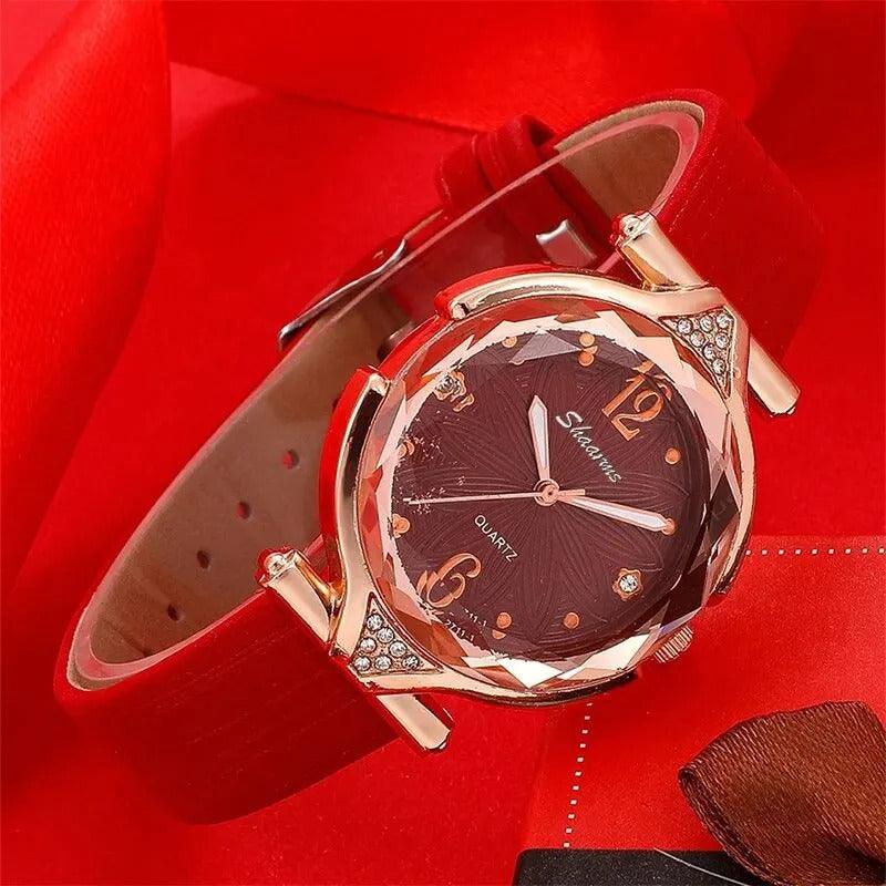 RELOJ ROJO DE CUERO +SET COMPLETO DE ACCESORIOS