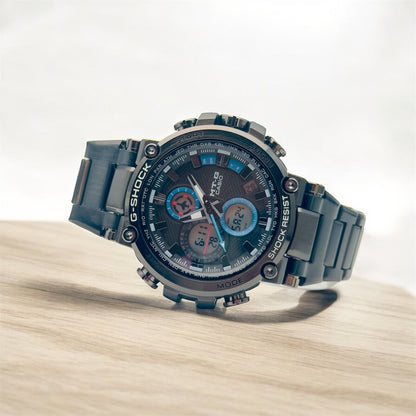 RELOJ CASIO MTG TITAN FORCE NEGRO/AZUL - FUERZA Y PRESTIGIO