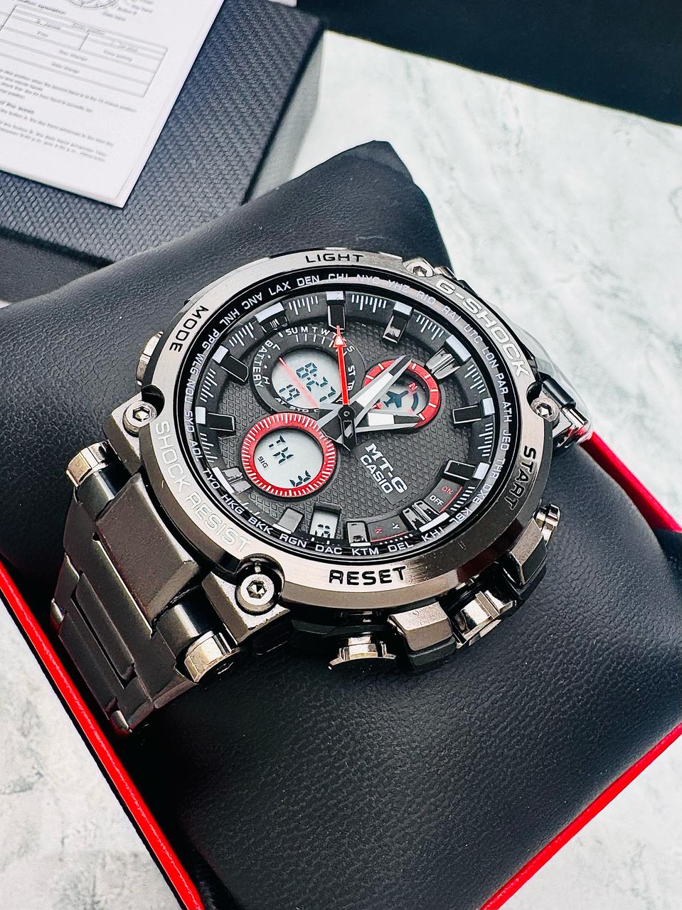 RELOJ CASIO MTG TITAN FORCE NEGRO/ROJO - FUERZA Y PRESTIGIO